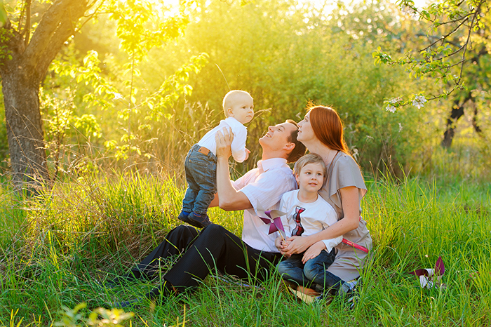 Family with two young children outdoors